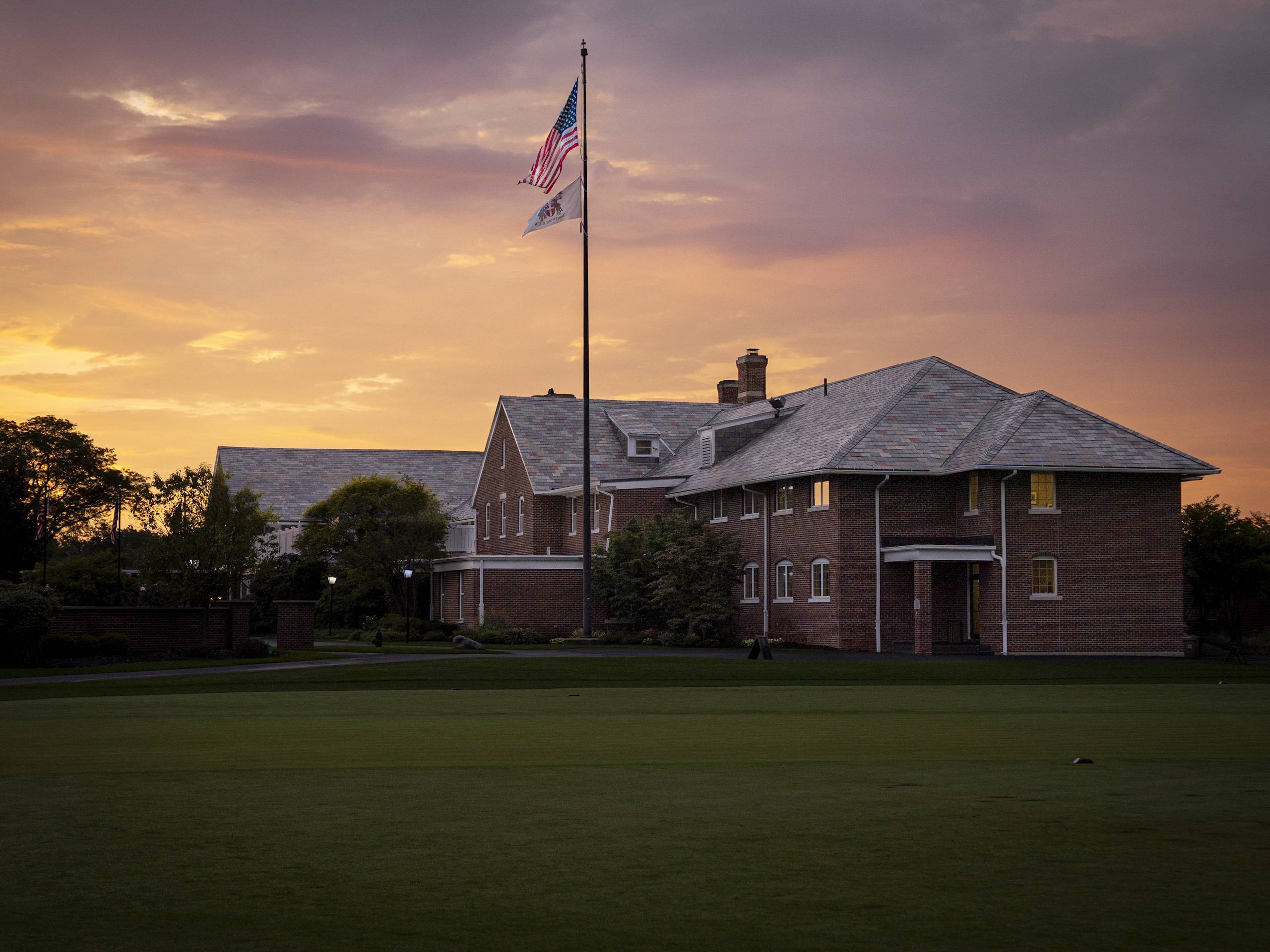golf clubhouse with flag