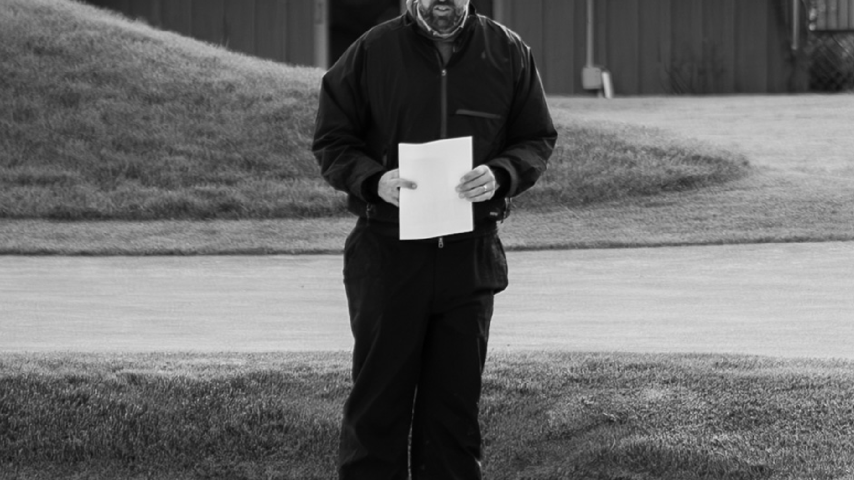 Andrew Green standing in a bunker at Inverness Club in Toledo, Ohio